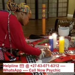 AFRICAN WOMAN SPELL CASTER
