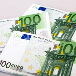 20984194-bundles-of-100-euro-bank-notes